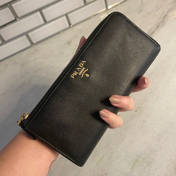 Prada Handbags - ❤️ Authentic PRADA Black Long Zippy Wallet Saffiano Leather GHW